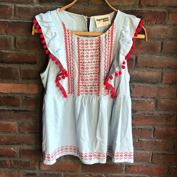 savanna jane Tops - NWT Savanna Jane Chambray Blue Flutter Sleeve Top with red Pom-poms Large